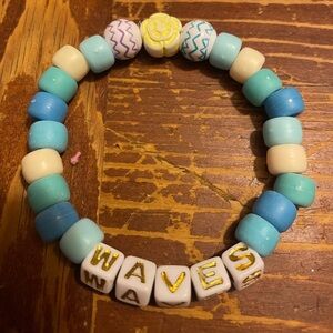 Colorful Beaded Bracelet with 'WAVES' letters